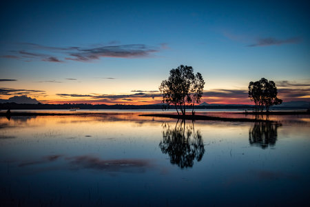 sunrise at Lake Sirindhorn Dam near the Town of Khong Chiam in Province of Ubon Ratchathani in...