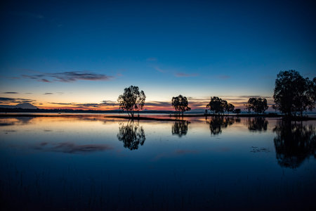sunrise at Lake Sirindhorn Dam near the Town of Khong Chiam in Province of Ubon Ratchathani in...