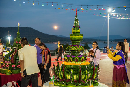 People make ready a Krathong at Loy Krathong Festival in Town of Khong Chiam in Province of Ubon Ratchathani in Thailand. Thailand, Khong Chiam, November, 27, 2023のeditorial素材