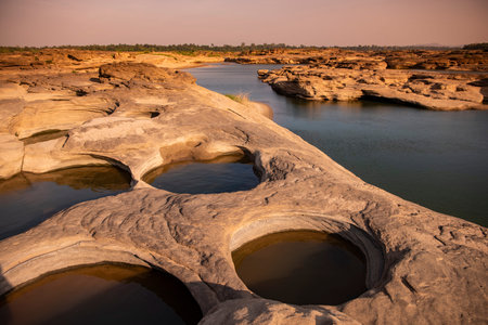 Kaeng Sam Phan Bok Canyon at Ban Song Khon Village at Mekong River in Province of Ubon Ratchathani in Thailand. Thailand, Khong Chiam, November, 28, 2023のeditorial素材