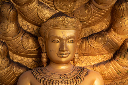 a golden Buddha figure at Wat Huay Mongkol near the City of Hua Hin in the Province of Prachuap...