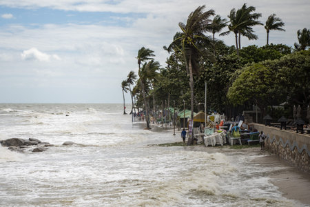 The Hua Hin Beach is flooded by storm, wind, and rain at the coast in Hua Hin in Province of Prachuap Khiri Khan in Thailand, Thailand, Hua Hin, November, 17, 2023のeditorial素材