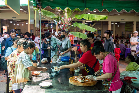 people enjoy free Thai Food at Temple Ceremony of Wat Hua Hin in City of Hua Hin at Province of...
