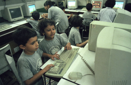 school Children at a Copmputer class in the city of Bangalore in the Province of Karnataka in India....