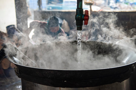 Workers at Rice Spirits Factory Ban Kruathong in Sa-iap Village in Province of Phrae in North...