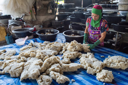 Workers at Rice Spirits Factory Ban Kruathong in Sa-iap Village in Province of Phrae in North Thailand. Thailand, Phrae, November, 25, 2024.のeditorial素材
