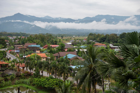 View with fog over Pua Town with view to Doi Phu Kha National Park in Province of Nan in North Thailand. Thailand, Pua, November, 18, 2024.のeditorial素材