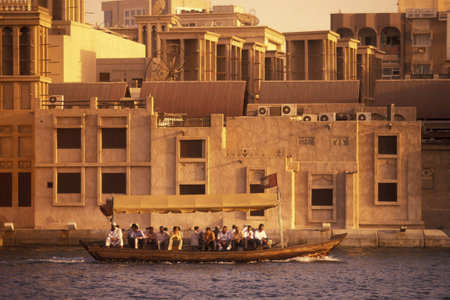 a city boat and ferry on the Dubai creek in the old town in the city of Dubai in the Arab Emirates...