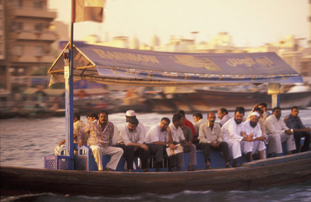 Ferry and Taxi Boats on Dubai Creek in old town in the city of Dubai in the UAE in the Gulf of...