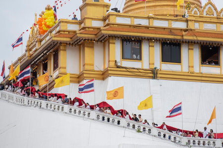 Ceremony on the way to Golden Mount at Wat Saket Festival Fair in Bangkok in Thailand. Thailand, Bangkok, November, 8, 2024.のeditorial素材