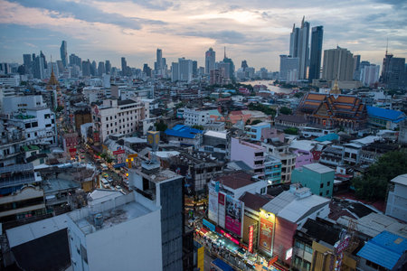 a view on Yaowarat Road in China Town with skyline in City of Bangkok in Thailand. Thailand,...