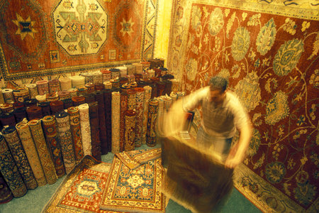a carpet shop at a market street at the Old Souq or Bazaar Kapali Carsi Market in the old town of the city Istanbul in Turkey. Turkey, Istanbul, May, 2002のeditorial素材