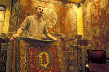 a carpet shop at a market street at the Old Souq or Bazaar Kapali Carsi Market in the old town of the city Istanbul in Turkey. Turkey, Istanbul, May, 2002のeditorial素材