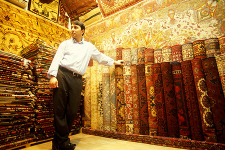 a carpet shop at a market street at the Old Souq or Bazaar Kapali Carsi Market in the old town of the city Istanbul in Turkey. Turkey, Istanbul, May, 2002のeditorial素材