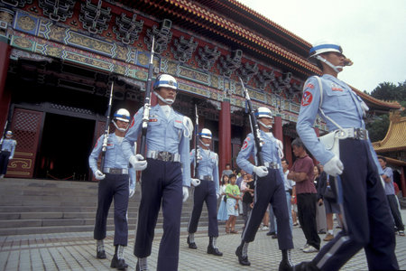 a guard at the Chiang Kai Shek Memorial Hall in the city center of Taipei in Taiwan of East Aasia....