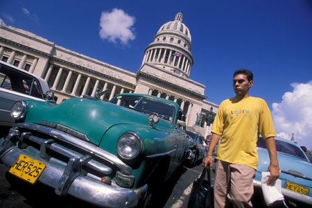 old american cars in front of the capitolio national in the city of Havana on Cuba in the caribbean sea. Cuba, Havana, October, 2005のeditorial素材