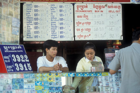 a money change shop in the city of Phnom Penh of Cambodia.  Cambodia, Phnom Penh, February, 2001,のeditorial素材