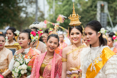 traditional thai dance at the tradititional Longboat Race at the Mun river of the town of Satuek...
