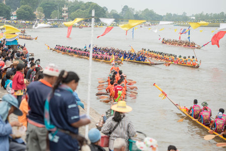 the tradititional Longboat Race at the Mun river of the town of Satuek north of the city Buri Ram in...
