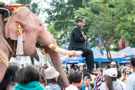 gouvernment people posing on a elephant at the tradititional Longboat Race at the Mun river of the...