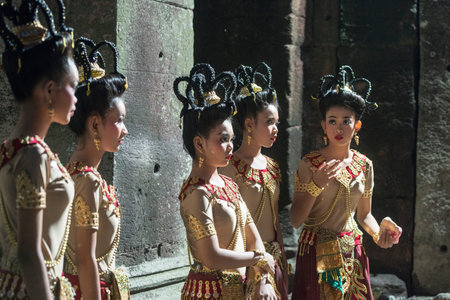 traditional dress Khmer dance girls at the Khmer Temple Ruins at the Phimai Festival in  Phimai in...