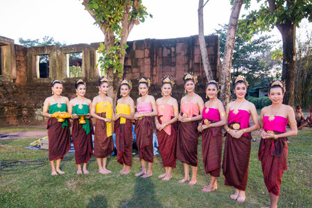 traditional dress Khmer dance girls at the Khmer Temple Ruins at the Phimai Festival in  Phimai in the Provinz Nakhon Ratchasima in Isan in Thailand.  Thailand, Phimai, November, 2017のeditorial素材