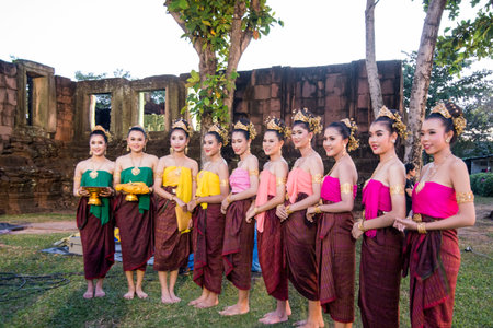 traditional dress Khmer dance girls at the Khmer Temple Ruins at the Phimai Festival in  Phimai in the Provinz Nakhon Ratchasima in Isan in Thailand.  Thailand, Phimai, November, 2017のeditorial素材