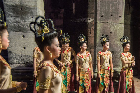 traditional dress Khmer dance girls at the Khmer Temple Ruins at the Phimai Festival in  Phimai in...