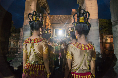 traditional dress Khmer dance girls at the Khmer Temple Ruins at the Phimai Festival in  Phimai in...