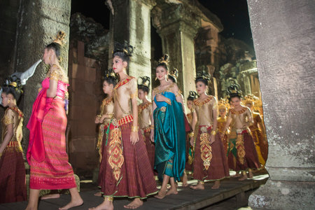 traditional dress Khmer dance girls at the Khmer Temple Ruins at the Phimai Festival in  Phimai in...