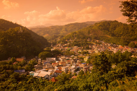 the town of Mae Sai, front, in Thailand and the town of Tachilek, top, in Myanmar on the Thailand &...