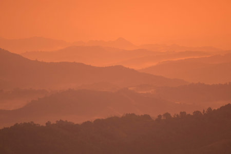 the landscape and sunrise over the town of Mae Salong north of the city Chiang Rai in North...