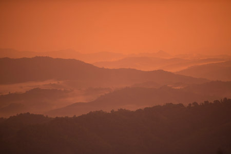 the landscape and sunrise over the town of Mae Salong north of the city Chiang Rai in North Thailand.のeditorial素材