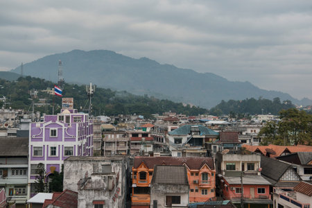 a city view of the town of Tachlieik of Myanmar naxt to the town of Mae Sai in Thailand on the Border to Thailand in the Chiang Rai Province in North Thailand.   Thailand, Mae Sai, November, 2019のeditorial素材