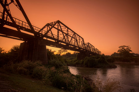 the railway bridge of the world war 2 at the wang river in the city of Lampang in North Thailand.