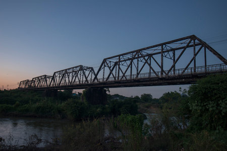 the railway bridge of the world war 2 at the wang river in the city of Lampang in North Thailand.
