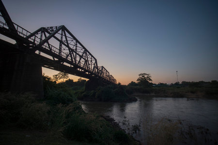 the railway bridge of the world war 2 at the wang river in the city of Lampang in North Thailand.のeditorial素材