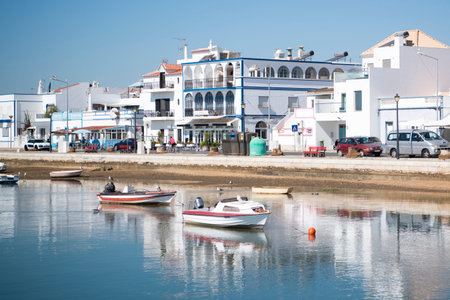 the landscape and coast at the town of Santa Luzia in the Algarve in the south of Portugal in...