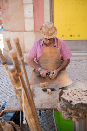 Cork art at the Saturday Market in the town of Loule in the Algarve in the south of Portugal in Europe.のeditorial素材