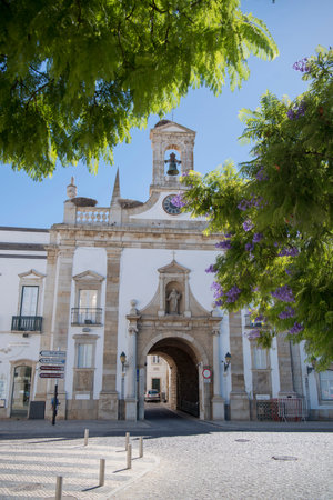 the arco da vila Gatel in the old town of Faro at the east Algarve in the south of Portugal in...