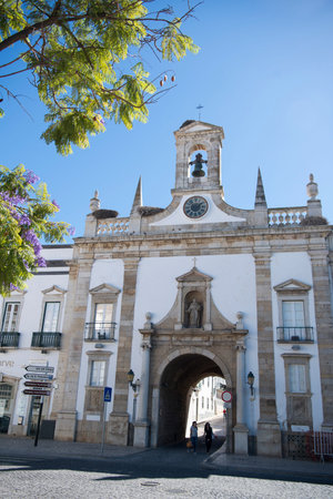the arco da vila Gatel in the old town of Faro at the east Algarve in the south of Portugal in...