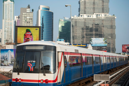 a bts skytrain over the trafic at the sathon road in the city centre at Sathon in the city of...