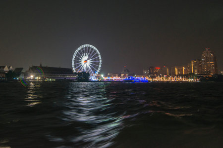 the Ferris Wheel of the Asiatique Riverfront Nightmarket in the city of Bangkok in Thailand.  Thailand, Bangkok, November, 2017のeditorial素材