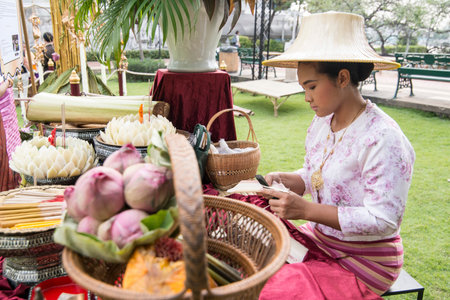 traditioal hand made Loy Krathong Lanterns and candles at a market at the Santichaiparakan park in...