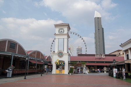 the clock tower of the Asiatique Riverfront Nightmarket in the city of Bangkok in Thailand.  Thailand, Bangkok, November, 2017のeditorial素材
