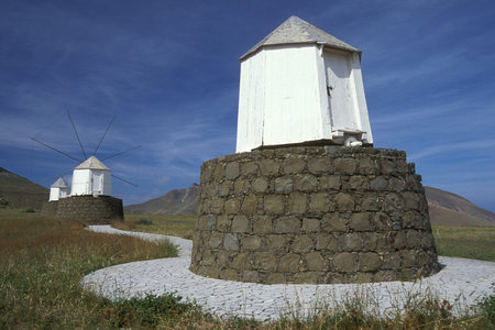 a traditional wind mill on the Island of Porto Santo ot the Madeira Islands in the Atlantic Ocean of...