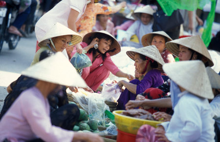 people at a market in the city of ho chi minh city in Vietnam