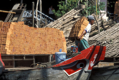 a Transport Boat on the Mekong River near the city of Can Tho in the Mekong Delta in Vietnam