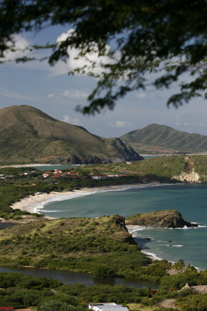 the Coast with the beach Playa Pedro Gonzalez in the town of Pedro Gonzalaz on the Isla Margarita in the caribbean sea of Venezuela.のeditorial素材