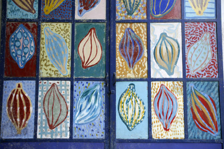 paintings of cacao beans at a road in the town of choroni near choroni on the caribbean coast in...